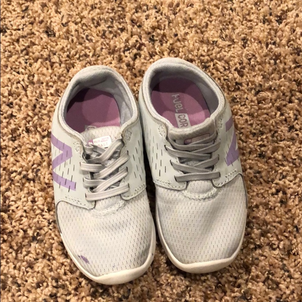 Gray and purple new balance shoes